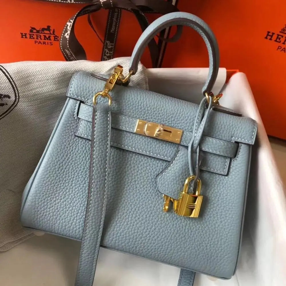 Elegant Bluish-Gray Hermès Kelly-Style Handbag with Gold Hardware Chic Tread