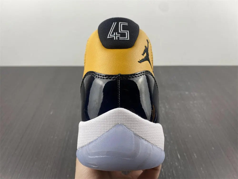 Air Jordan 11 Retro Black Yellow New with Tag & Box Metroutfits