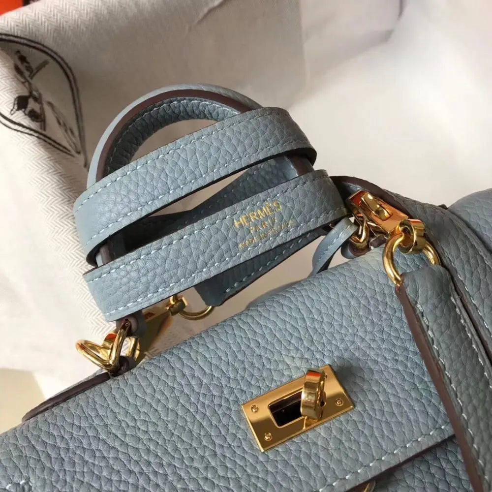 Elegant Bluish-Gray Hermès Kelly-Style Handbag with Gold Hardware Chic Tread