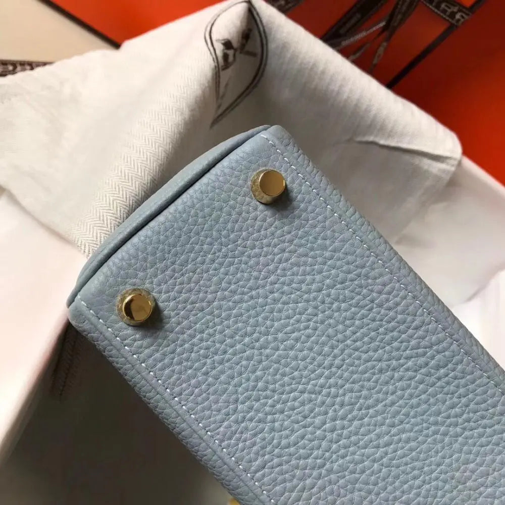 Elegant Bluish-Gray Hermès Kelly-Style Handbag with Gold Hardware Chic Tread