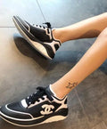 Chanel Women's Sneaker Black White Metroutfits
