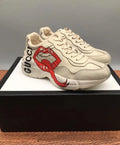 Gucci Women’s Rhyton Mouth Print Ivory Sneakers Metroutfits