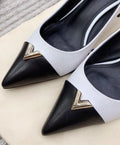 Louis Vuitton Heartbreaker White Black Pumps New with Tag and Box Metroutfits